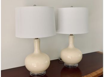 Pair Of Safavieh Modern Cream Ceramic Lamps On Lucite Bases With Brass Details
