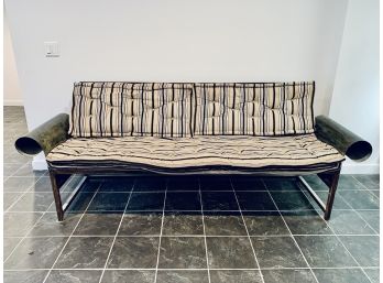 Large Wrought Iron Bench With Arms And Striped Cushions