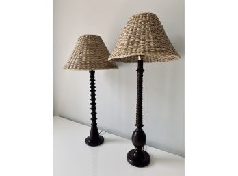 Pair Of Dark Turned Wood Stick Table Lamps With Rattan Shades - Different Heights