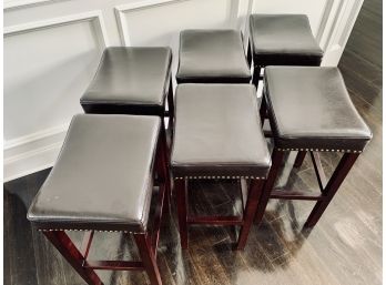 Set Of 6 Black Faux Leather Bar Stools With Brass Nail Head Detail And Dark Wood Legs