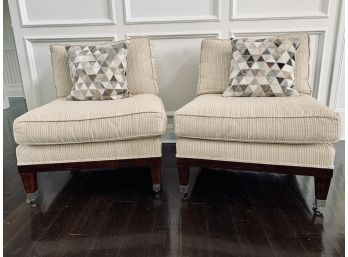 Pair Of Century Furniture Company Armless Upholstered Chairs With Dark Wood Legs And Chrome Accents And Wheels