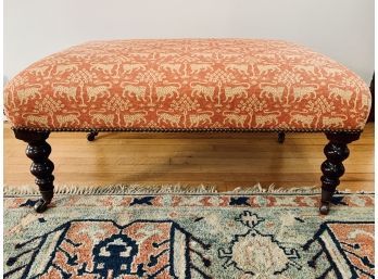 Red/yellow Upholstered Cheetah Fabric Ottoman With Brass Nailhead Detail