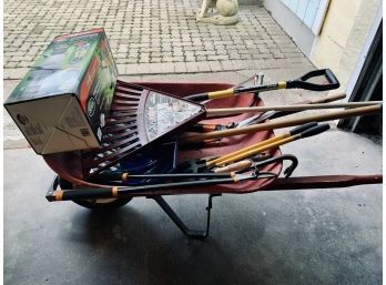 Collection Of Garden Tools And Wheel Barrow