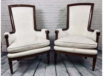 Pair Of White Leather Chairs With Brass Nailhead Detail