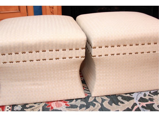 Pair Of Cream Upholstered Ottomans With Nailhead Detail