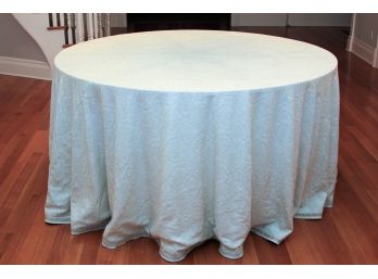 Round Skirted Table With Cream Linen Cloth