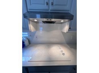 GE Electric White Glass Cooktop With Broan Stainless Vent Hood