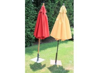 Pair Of Red And Yellow Patio Umbrellas