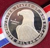 Two Olympic Proof Coins - One 1983-S Silver Dollar And One 1995-s Clad Half Dollar