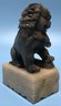 Two (2) Pcs Non-Matching Vintage Foo Dogs On Plinths, 1-Larger Ceramic And A Smaller Gray Marble