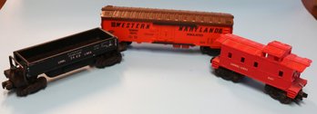 Three Lionel 0/027  Railcars - Caboose - 6167 - 3469 Dump Car - 19511 Western Maryland Reefer