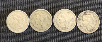 Four United States Nickel Three Cent Pieces - 1865 1868 1869 1871 (damaged)