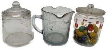 3 Pcs Vintage Glass - 2-Covered Jars 1-Decorated W/Game Marbles & Pale Blue Depression Glass Measuring Cup