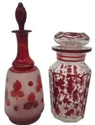 2 Pcs Antique Clear Glass Vessels 1 With Ruby Enamel Design And Frosted 1 Frosted Caster With Numbered Stopper