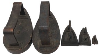 5 Pcs Collection Antique Sad Irons, 1-Bronze '7 U', 4-Cast Iron Marked 'DC 5', '2', '1' & 1- Is Itty-bitty