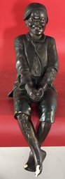 Vintage Painted Chalk Figure Of Black Americana Boy Fishing With Dangling Legs, Fishing Pole Not Present, 18'L