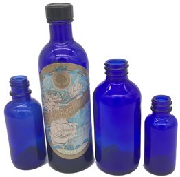 4 Vintage Cobalt Blue Bottles Including Eau De Rose Rose Water, 2' Diam. X 6.5'H