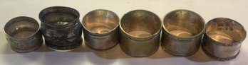 7 Pcs Victorian Silver Plate Napkin Rings, Oval And Round, One Monogrammed