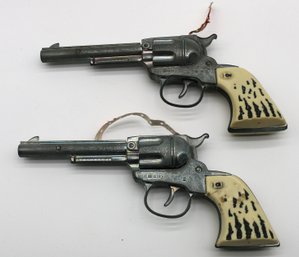 Two Daisy Cap Pistols