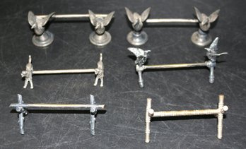 Lot Of Six Assorted Metal Knife Rests