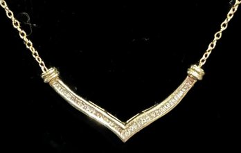 14 KT Yellow Gold Chain With Channel Set Diamonds In 12KT In Chevon Shaped Setting, Total Weight 2.02 Dwt