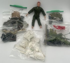 Vintage GI Joe Doll With A Large Collection Of Clothes And Accessories