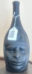Vintage Black Molded Ceramic Bottle With Embossed Face, 12'H