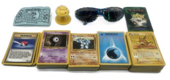 Large Quantity Of Vintage Pokemon Cards, Sunglasses And Other Items (Cards Have Not Been Gone Through)