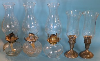 3 Oil Lanterns And Two Pewter Candle Holders With Etched Shades