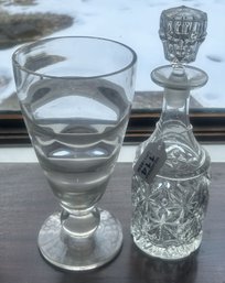 2 Pcs Pressed Glass Decanter With Stopper, 4.5' Diam. X 12'H And Footed Flower Vase, 5' Diam. X 9.75'H