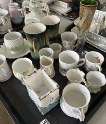 18 Pcs Porcelain Cups, Creamers, Tall Enameled Glass Vase And Others