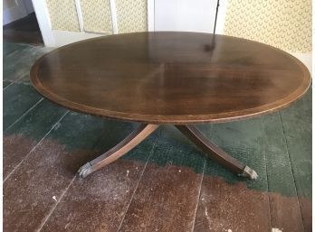 Mahogany Oval Coffee Table Brass Cap Paws