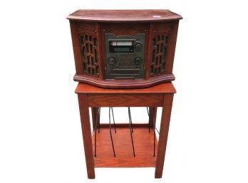 Combination AM/FM Radio, Turn-Table, And CD Recorder/Player On Record Stand