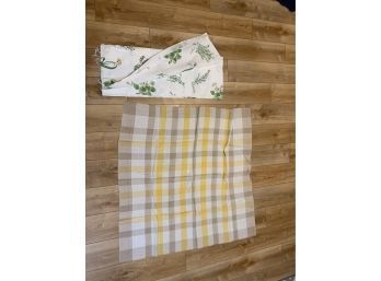 One Brown And Gold Tablecloth And Fabric Piece With Herbs