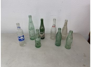 Lot Of 8 Glass Soda Bottles Incl Pepsi, Coke, Mr. Cola, Mountain Dew Etc