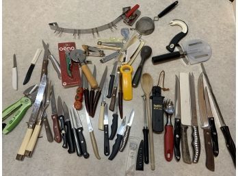 Huge Lot Of Kitchen Knives Of Different Styles And Holder.  Also Can Openers And Pizza Cutters
