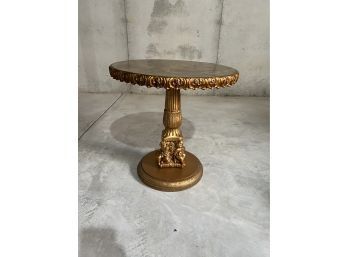 Small Gold Colored Table With Cherubs On Base