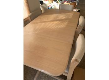 Light Wood Table With 2 Leaves And 6 Rolling  Chairs
