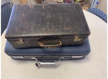 2 Old Suit Cases, One Marked American Tourister