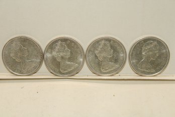 Coins - Circulated -  Silver - 4 X Canadian 1967 - Silver Quarters - Elizabeth II   (4 Total)