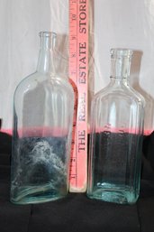 Vintage  2  Medicine Pale Blue Bottles,  1 Has  'Dr. Miles Nervine '  7-8 Inch Approx