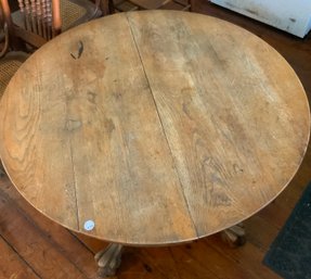 Round Oak Center Pedestal Claw Foot Table