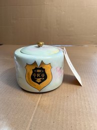Continental Floral Painted Porcelain Lidded Jar, Pi Kappa Psi Gilt Badge